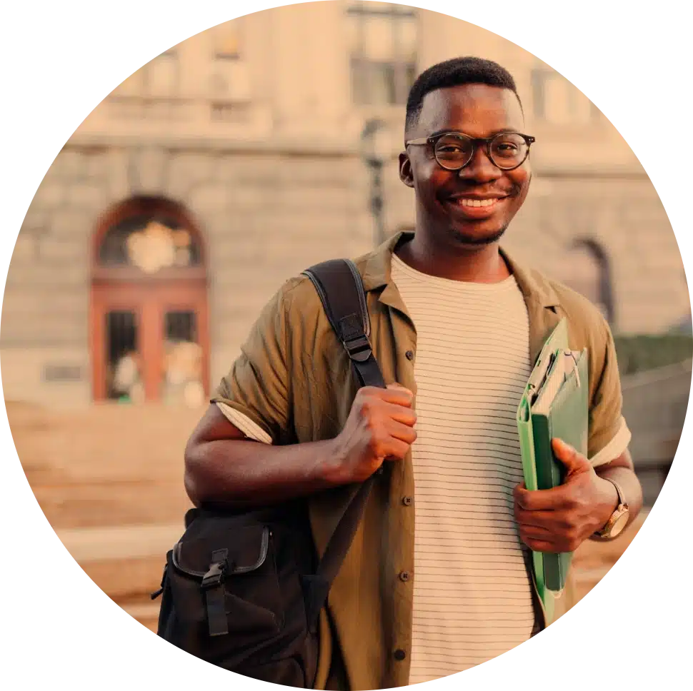 a man with a backpack holding a folder and smiling